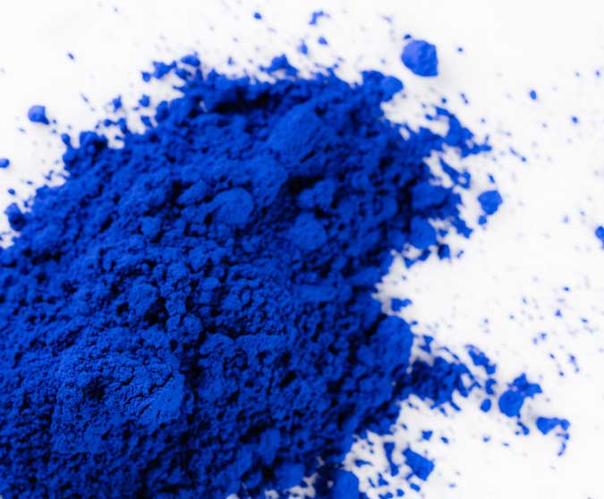 Blight blue powder on a white background